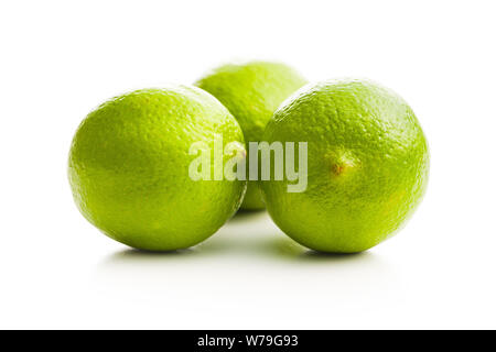 The green limes isolated on white background. Stock Photo