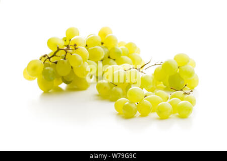 Tasty green grapes. White grape isolated on white background. Stock Photo