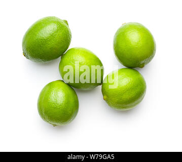The green limes isolated on white background. Stock Photo