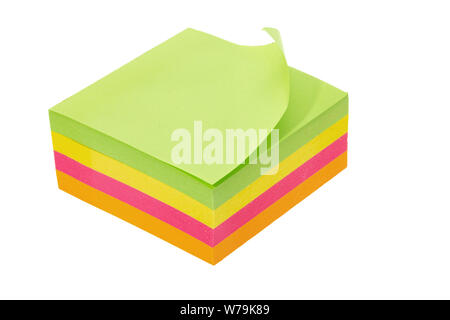 Multi coloured adhesive paper notepad - white background Stock Photo