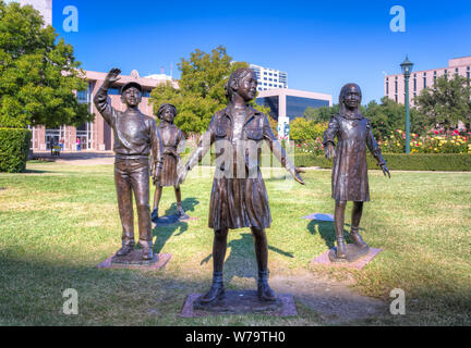 AUSTIN,TX/USA - NOVEMBER 15: Tribute to Texas Children statues on the grounds of the Texas State Capitol celebrating youth of Texas. November 15, 2013 Stock Photo