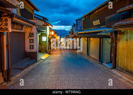 Kyoto, Japan - April 24, 2017: the ancient street of Hanami Lane or Hanamikoji Dori in the Gion District, at World Heritage at dusk. Gion is Kyoto's Stock Photo