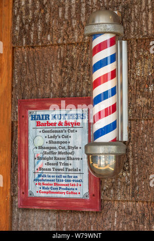 Rutherfordton, NC, USA-27 July 19: A Barber shop, Hair Kutters Barber & Style, sets on Main Street in Rutherfordton, NC. Stock Photo