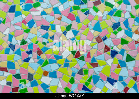Colorful pastel vivid colour and various geometric shape and size of mosaic tile with random pattern. Stock Photo