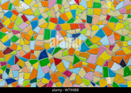 Colorful pastel vivid colour and various geometric shape and size of mosaic tile with random pattern. Stock Photo