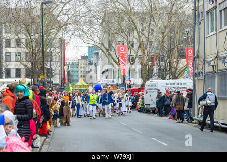 Atmosphere of celebration, parade, fancy cosplay at carnival, Rosenmontagszug (Rose Monday Parade), in Düsseldorf old town, Germany. Stock Photo