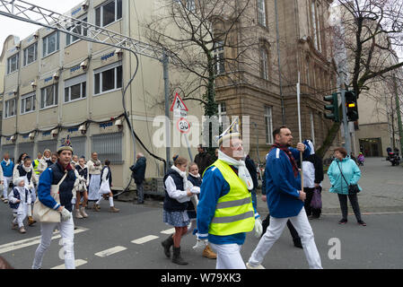 Atmosphere of celebration, parade, fancy cosplay at carnival, Rosenmontagszug (Rose Monday Parade), in Düsseldorf old town, Germany. Stock Photo