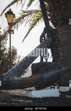 Historic anchor on the mainland in Playa Blanca on the island of Lanzarote Stock Photo
