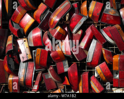 Many taillights from cars in the service station. Stock Photo