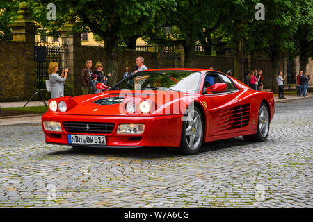 GERMANY, FULDA - JUL 2019: red FERRARI TESTAROSSA Type F110 coupe is a 12-cylinder mid-engine sports car manufactured by Ferrari, which went into prod Stock Photo