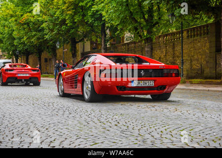 GERMANY, FULDA - JUL 2019: red FERRARI TESTAROSSA Type F110 coupe is a 12-cylinder mid-engine sports car manufactured by Ferrari, which went into prod Stock Photo