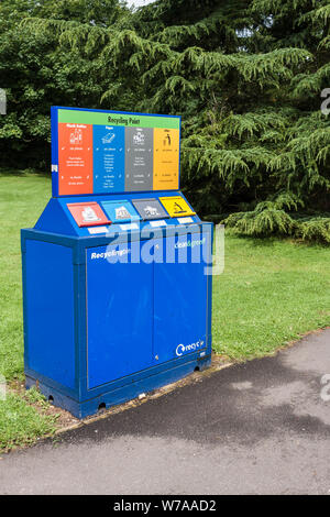 Recycling Point colour coded for plastics, paper, cans and general waste litter Stock Photo