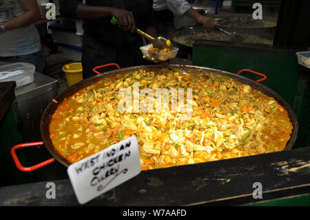 A TASTE FOR IT: Borough market in the UK has a variety of appetizing eats which include hearty stews, fresh fish, and delicious soups from all walks. Stock Photo