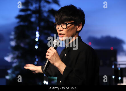 Tokyo, Japan. 5th Aug, 2019. Ichiro Yamaguchi, a member of a rock band Sakanaction attends an opening event of an installation 'Roof Top Orchestra' at the Ginza Six shopping mall in Tokyo as he produced it on Monday, August 5, 2019. Roof Top Orchestra, a sound and light installation at the rooftop garden on the 13 story Ginza Six building, will be carried through October 31. Credit: Yoshio Tsunoda/AFLO/Alamy Live News Stock Photo