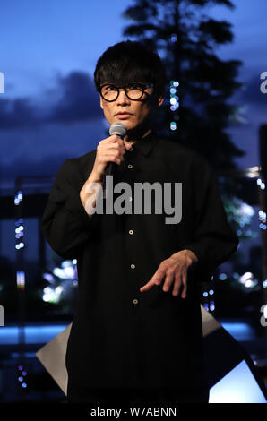 Tokyo, Japan. 5th Aug, 2019. Ichiro Yamaguchi, a member of a rock band Sakanaction attends an opening event of an installation 'Roof Top Orchestra' at the Ginza Six shopping mall in Tokyo as he produced it on Monday, August 5, 2019. Roof Top Orchestra, a sound and light installation at the rooftop garden on the 13 story Ginza Six building, will be carried through October 31. Credit: Yoshio Tsunoda/AFLO/Alamy Live News Stock Photo