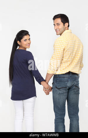 Rear view of a couple standing Stock Photo