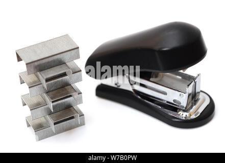 a lot of staple and stapler on white background Stock Photo