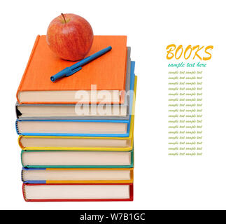 colorful books, apple and pen isolated on white background Stock Photo