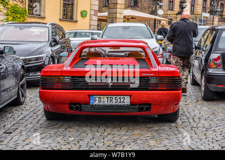 GERMANY, FULDA - JUL 2019: red FERRARI TESTAROSSA Type F110 coupe is a 12-cylinder mid-engine sports car manufactured by Ferrari, which went into prod Stock Photo