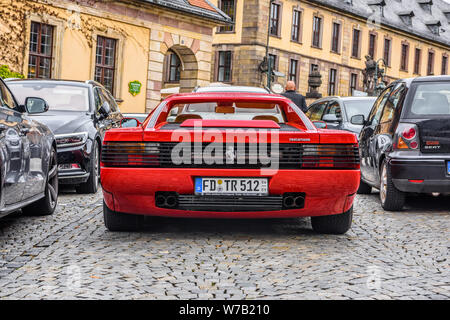 GERMANY, FULDA - JUL 2019: red FERRARI TESTAROSSA Type F110 coupe is a 12-cylinder mid-engine sports car manufactured by Ferrari, which went into prod Stock Photo