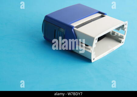 Automatic ink stamp manufactured in blue plastic Stock Photo