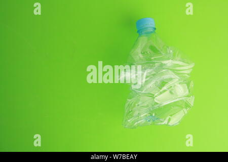 Empty plastic water bottle scaled for recycling Stock Photo