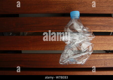 Empty plastic water bottle scaled for recycling Stock Photo