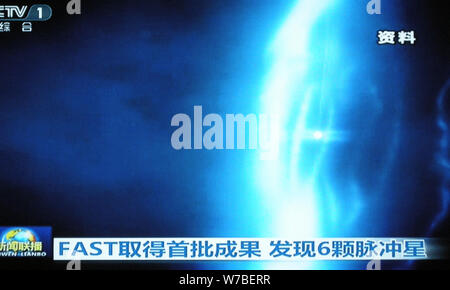 In this TV grab taken by CCTV (China Central Television) on 10 October 2017, the world's largest radio telescope called FAST (Five-hundred-meter Apert Stock Photo