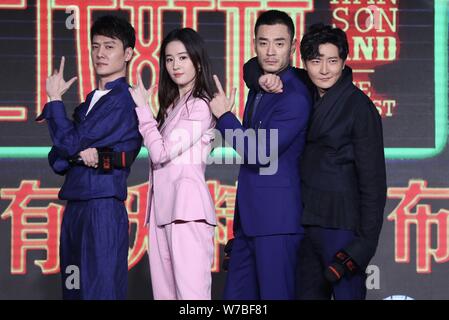 Chinese actor Feng Shaofeng, left, and actress Liu Yifei, second left, attend a press conference for their movie 'Hanson And The Beast' in Beijing, Ch Stock Photo