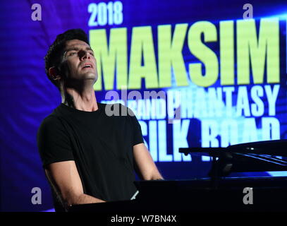 Croatian pianist Maksim Mrvica performs during a launch event for '2018 Maksim & his band phantasy of the silk road' in Beijing, China, 24 October 201 Stock Photo