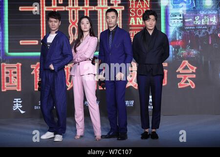 Chinese actor Feng Shaofeng, left, and actress Liu Yifei, second left, attend a press conference for their movie 'Hanson And The Beast' in Beijing, Ch Stock Photo