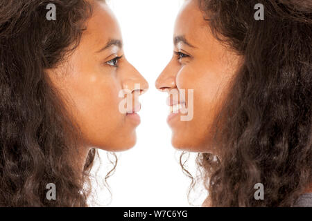 comparison of young women before and after nose surgery Stock Photo