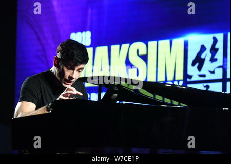 Croatian pianist Maksim Mrvica performs during a launch event for '2018 Maksim & his band phantasy of the silk road' in Beijing, China, 24 October 201 Stock Photo