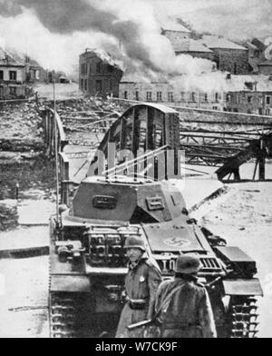 Destruction of bridge over River Meuse by Belgians to stop German advance, World War 2, 1940. Artist: Unknown Stock Photo