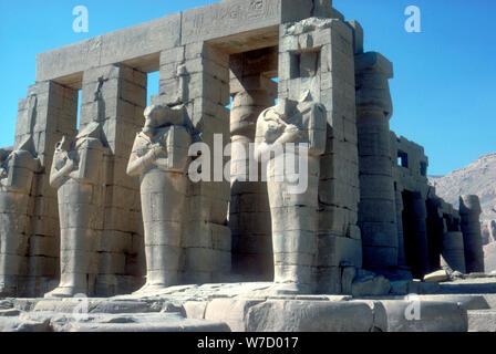Colossal statues of pharaoh Ramses II carved into rock by the ancient ...