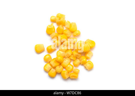 Boiled canned corn, corn kernels isolated on white background - top view Stock Photo