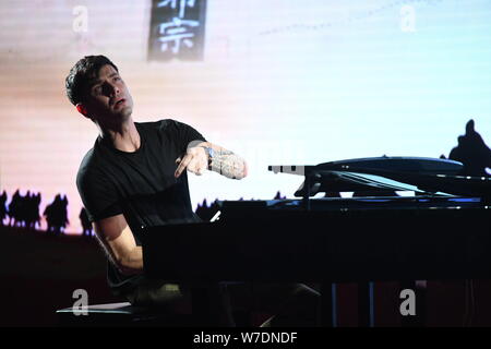 Croatian pianist Maksim Mrvica performs during a launch event for '2018 Maksim & his band phantasy of the silk road' in Beijing, China, 24 October 201 Stock Photo