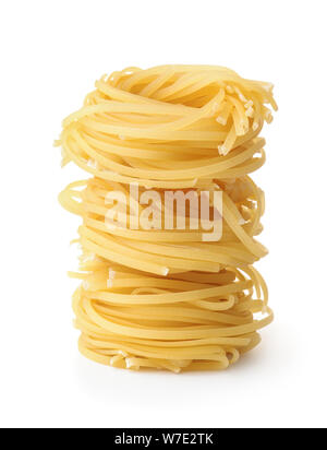 Stack of uncooked tagliolini pasta nest isolated on white Stock Photo