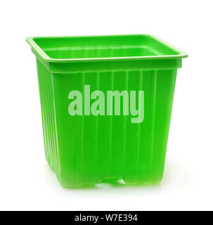 Green plastic seedlings nursery pots isolated on white Stock Photo