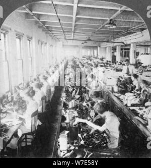 Sewing room in a large shoe factory, Syracuse, New York, USA, early 20th century. Artist: Keystone View Company Stock Photo