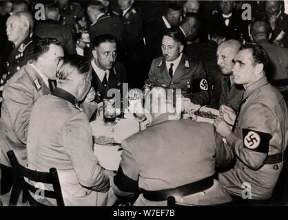 Nazi Deputy Leader Rudolf Hess with party colleagues, Bürgerbräukeller, Munich, October 1937. Artist: Unknown Stock Photo