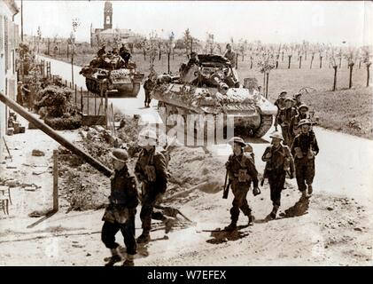 British 8th Army troops and tanks on the road to Ferrara, Italy, April 1945. Artist: Unknown Stock Photo
