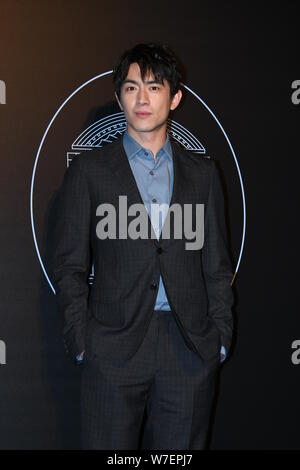 Chinese actor Kenny Lin or Lin Gengxin poses for portrait photos during ...