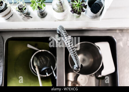 overhead view of kitchen sink and tap, with curved gooseneck tap Stock Photo