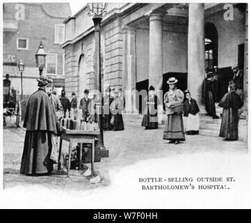 Bottle selling outside St Bartholomew's Hospital, London, c1903 (1903). Artist: Unknown. Stock Photo