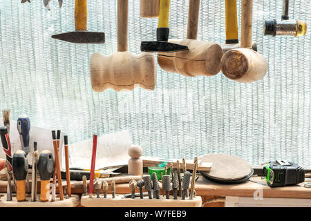 Close-up woodwork tool set. Different hammers, Rasp-file burr countersink kit. Carpentry woodworking workshop concept Stock Photo