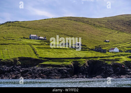 Abandoned village on Great Blasket Island viewed from boat - Dingle Peninsula, County Kerry, Republic of Ireland Stock Photo