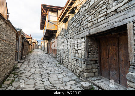 Lahic, Ismayilli region, Azerbaijan - April 27, 2019. Cobblestone Huseynov street in Lagic village in Ismayilli region of Azerbaijan, with historic bu Stock Photo
