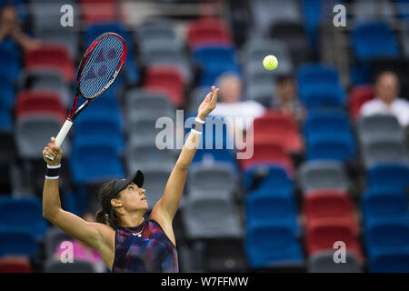 Caroline Garcia of France serves against Angelique Kerber of Germany in their first round match of the women's singles during the WTA Wuhan Open 2017 Stock Photo