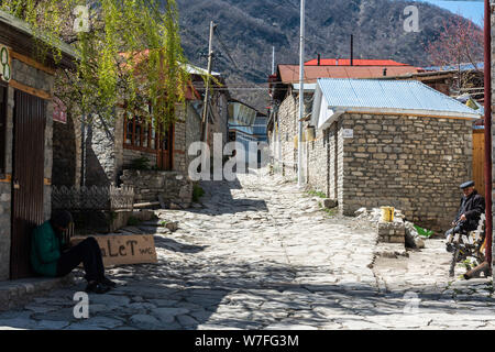 Lahic, Ismayilli region, Azerbaijan - April 28, 2019. Street view in Lagic village in Ismayilli region of Azerbaijan, with historic buildings and peop Stock Photo